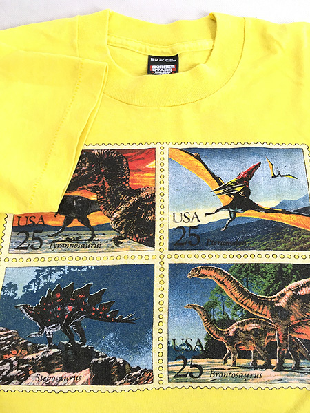 [4] キッズ 古着 80s USA製 恐竜 4種連刷 切手 プリント Tシャツ 黄 6歳位 古着